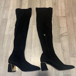 Elegant Black Heeled Boots with Gold Accent